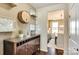 Hallway with sideboard, glassware, and decor barrel; leads into dining area at 3542 Rapport Ct # 37, Lancaster, SC 29720