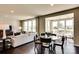 Open concept living room with large windows and modern furniture at 3542 Rapport Ct # 37, Lancaster, SC 29720