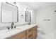 Bathroom featuring double vanity, granite countertops, and a commode at 3646 46Th Ne Ave, Hickory, NC 28601