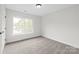 Neutral bedroom featuring plush carpet and a large window at 3646 46Th Ne Ave, Hickory, NC 28601