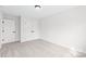 Neutral bedroom featuring a double door closet and a single door entrance at 3646 46Th Ne Ave, Hickory, NC 28601