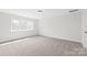 Spacious bedroom filled with natural light from the single window at 3646 46Th Ne Ave, Hickory, NC 28601