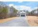 Charming new construction home with a dark garage door and inviting covered porch at 3646 46Th Ne Ave, Hickory, NC 28601