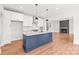 Modern kitchen with white cabinets, granite countertops, a central island, and stainless steel appliances at 3646 46Th Ne Ave, Hickory, NC 28601