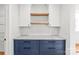Custom pantry features navy blue cabinets, open shelves, granite countertop, and subway tile backsplash at 3646 46Th Ne Ave, Hickory, NC 28601