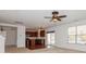 Bright living room showcases an open-concept design with hardwood floors in the kitchen at 420 Augustus Ln, Mount Holly, NC 28120