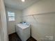 Laundry room with washer and dryer hookups and a window for natural light at 514 Meadowrock Dr, Albemarle, NC 28001
