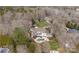 Aerial view of a luxury estate with a pool and private lake access at 706 Eagle Point Ct, Weddington, NC 28104