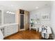 Bathroom with a shower, tub, and hardwood floors at 706 Eagle Point Ct, Weddington, NC 28104