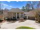 Stately home featuring a circular driveway and a grand facade with columns and attached two-car garage at 706 Eagle Point Ct, Weddington, NC 28104