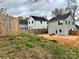 Spacious backyard featuring a patio and privacy fence at 711 E 3Rd Ave, Gastonia, NC 28054