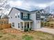 Attractive two-story home with a well-maintained lawn and inviting curb appeal at 711 E 3Rd Ave, Gastonia, NC 28054