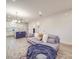 Open-concept living room seamlessly connects to the kitchen, creating a spacious and inviting atmosphere at 711 E 3Rd Ave, Gastonia, NC 28054