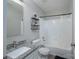 Bathroom featuring a shower-tub combo, granite vanity, and modern fixtures at 7209 Tressel Ln, Mint Hill, NC 28227