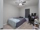 Bedroom with a window, ceiling fan, and desk space for work at 7209 Tressel Ln, Mint Hill, NC 28227