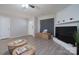 Inviting living room with a white fireplace, modern furniture, and an open layout at 7209 Tressel Ln, Mint Hill, NC 28227