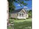Beautiful single-story home featuring a covered porch and well-maintained landscaping at 0 Tanglewood Dr # 9, Salisbury, NC 28144