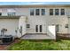 Private backyard with a patio and well-maintained lawn, perfect for outdoor enjoyment and relaxation at 111 Charterhouse Ln, Fort Mill, SC 29715