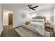 Bedroom with a ceiling fan, a neutral color scheme, wood floors, and natural light at 119 N Smallwood Pl, Charlotte, NC 28216