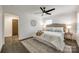 Bedroom featuring a ceiling fan, a warm color pallet, and hardwood flooring at 119 N Smallwood Pl, Charlotte, NC 28216