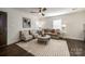 Bright living room with hardwood floors, stylish furniture, and modern decor at 119 N Smallwood Pl, Charlotte, NC 28216