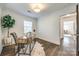 This bright office features hardwood floors, a wooden desk, and crisp white walls at 119 N Smallwood Pl, Charlotte, NC 28216