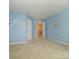 A simple secondary bedroom features carpet and two windows at 120 Snead Rd, Fort Mill, SC 29715