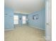 A simple secondary bedroom features carpet and two windows at 120 Snead Rd, Fort Mill, SC 29715