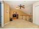 Open bonus room featuring neutral carpet, ceiling fan, and wooden railing at 120 Snead Rd, Fort Mill, SC 29715