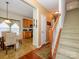 Open entryway with hardwood floors, carpeted stairs, and dining area to the left at 120 Snead Rd, Fort Mill, SC 29715