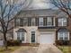 Charming two-story townhouse with a one-car garage and well-maintained landscaping at 120 Snead Rd, Fort Mill, SC 29715