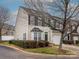 Two-story townhouse with siding, shutters, landscaped front yard and a one-car garage at 120 Snead Rd, Fort Mill, SC 29715