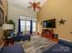 Spacious living room with vaulted ceilings, hardwood floors, and comfortable seating at 120 Snead Rd, Fort Mill, SC 29715