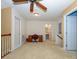 Upstairs loft area with carpet, desk and a bathroom at 120 Snead Rd, Fort Mill, SC 29715