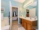 The en-suite bathroom leads back to the primary bedroom at 120 Snead Rd, Fort Mill, SC 29715