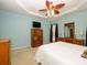 A spacious main bedroom features a tray ceiling, ceiling fan, carpet, and TV at 120 Snead Rd, Fort Mill, SC 29715