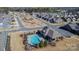 Aerial view showcasing community amenities including pool, clubhouse, and residential area at 1284 Independence St, Tega Cay, SC 29708