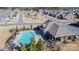 Aerial view of a community pool, clubhouse, and surrounding homes at 1284 Independence St, Tega Cay, SC 29708