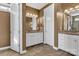 The bathroom features tile flooring, granite countertops, and white cabinetry at 1284 Independence St, Tega Cay, SC 29708