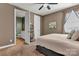This bedroom features carpet, a window, and an ensuite bathroom at 1284 Independence St, Tega Cay, SC 29708