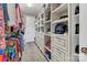 Walk-in closet features custom shelving and storage system at 1284 Independence St, Tega Cay, SC 29708