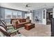 Spacious living room with a games table, comfortable seating, and stylish decor at 1284 Independence St, Tega Cay, SC 29708