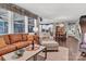 Inviting living room featuring a comfortable leather sofa, open floor plan, and stylish decor with natural light at 1284 Independence St, Tega Cay, SC 29708