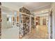 Spacious living area featuring a stone wall and tile flooring at 13019 Westmoreland Farm Rd, Davidson, NC 28036