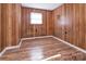 This bedroom is complete with hardwood flooring and one window for natural light at 132 Kennedy Ave, Kannapolis, NC 28083