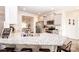 Modern kitchen with stainless appliances, granite counters, and a breakfast bar, perfect for casual dining at 137 Tenth Green Ct, Statesville, NC 28677