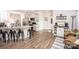Modern kitchen boasts granite countertops, stainless appliances, and a convenient breakfast bar at 137 Tenth Green Ct, Statesville, NC 28677