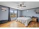 Bedroom with natural light, ceiling fan and hardwood flooring at 1691 Hopewell Church Rd, Catawba, NC 28609