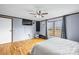Spacious bedroom with hardwood floors, flat screen TV and natural lighting at 1691 Hopewell Church Rd, Catawba, NC 28609