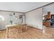 Bright dining room featuring hardwood floors and space to eat at 1691 Hopewell Church Rd, Catawba, NC 28609